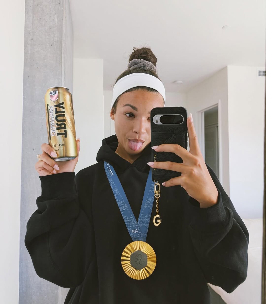 Instagram post by @sophiawilson for Truly Hard Seltzer. Caption reads: a can of gold? yes please!😜 @truly.