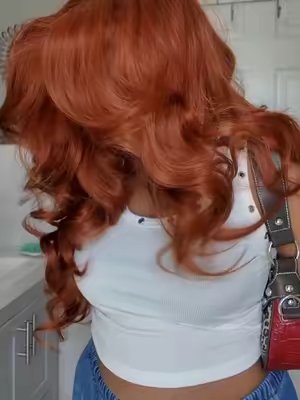 TikTok post by @simplychloeashley for SamsBeauty. Caption reads: @SamsBeauty @outre #fyp #syntheticwig #gingerhair....
