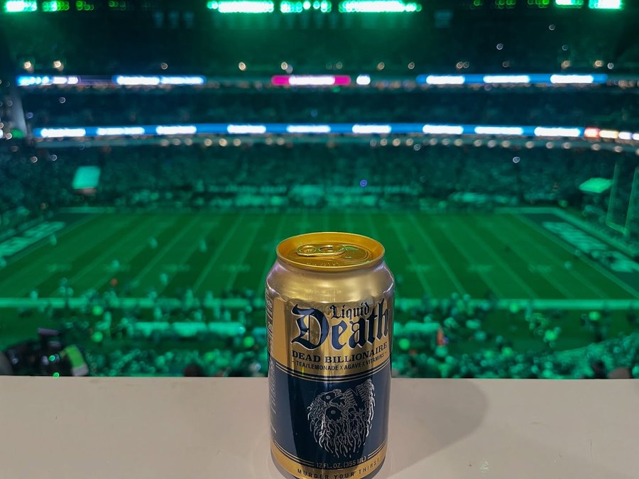 Instagram post by @rosstuckernfl for Liquid Death. Caption reads: [...] office view is presented by @liquiddeath,....