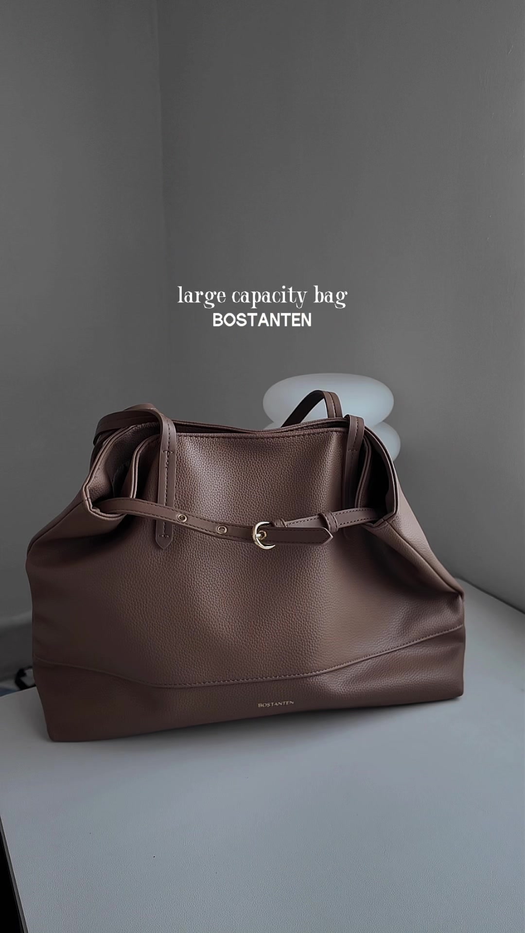 TikTok post by @ellymdd for Bostanten. Caption reads: [...] for work, travel, and everyday bag! 👜....