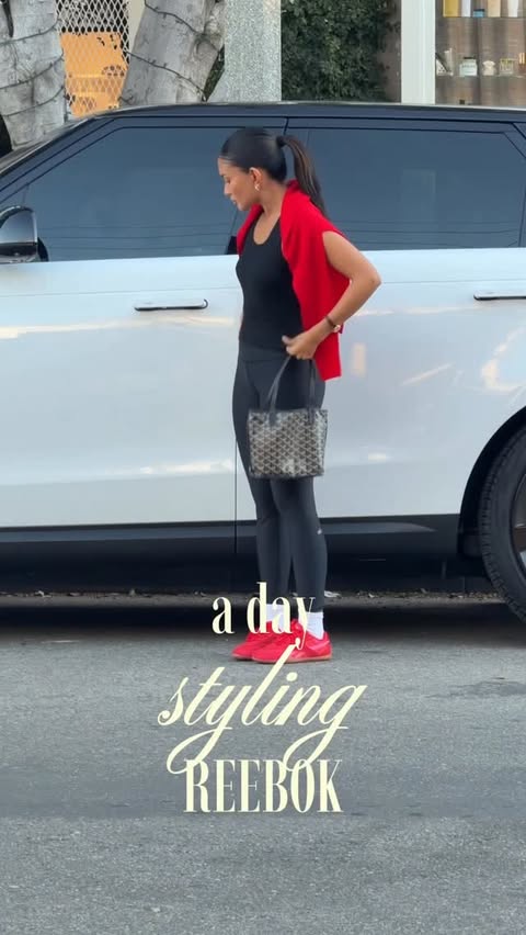 Instagram post by @piashah_ for Reebok. Caption reads: [...] the season for a little pop of red🎁 @reebok....