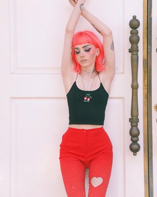 Instagram post by @kirrakaye for STIIIZY. Caption reads: happy fourth of july AKA halloween first !! 🎃....