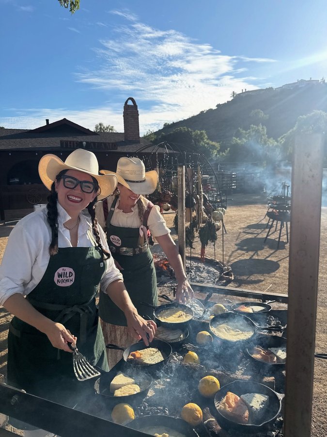 Instagram post by @thewildkitchenglobal for Hedley & Bennett. Caption reads: Cooking up a storm with my amazing sister....