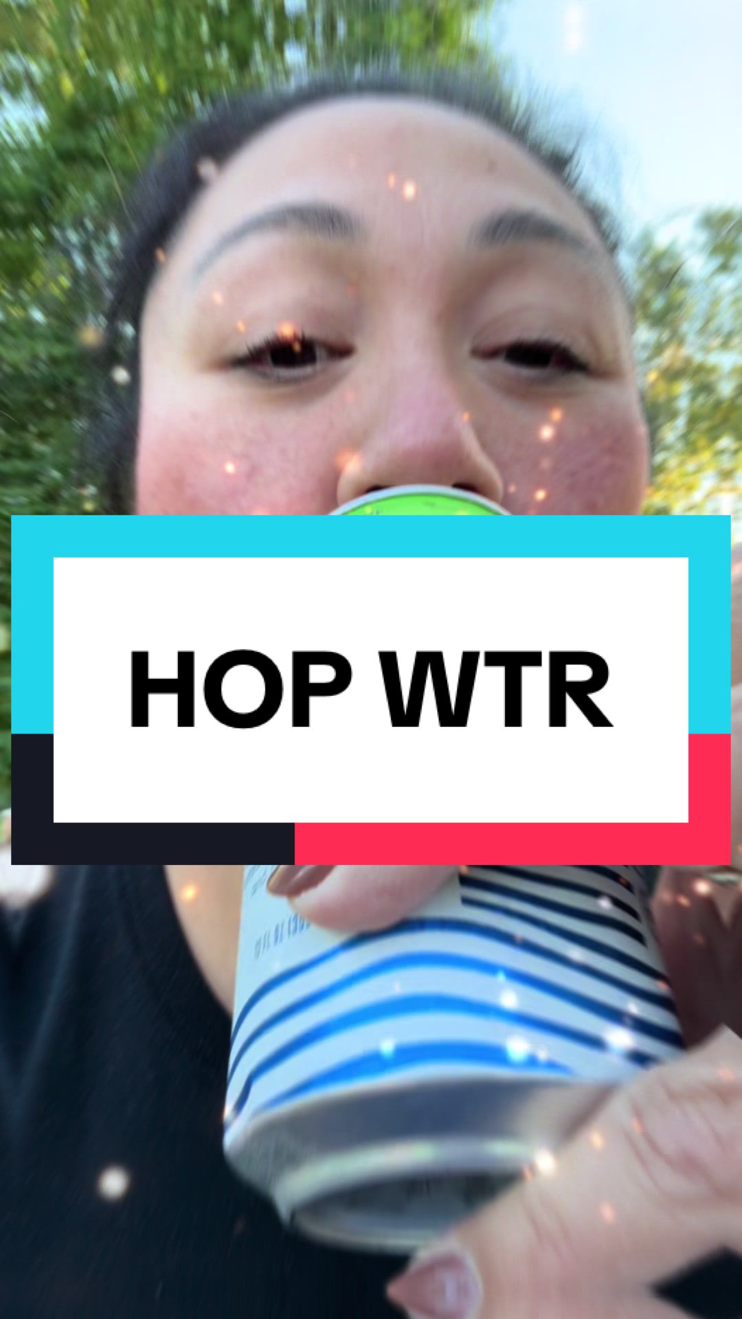TikTok post by @shopnoshash for Hopwtr. Caption reads: So refreshing! @HOP WTR #hopwtr #refreshing....