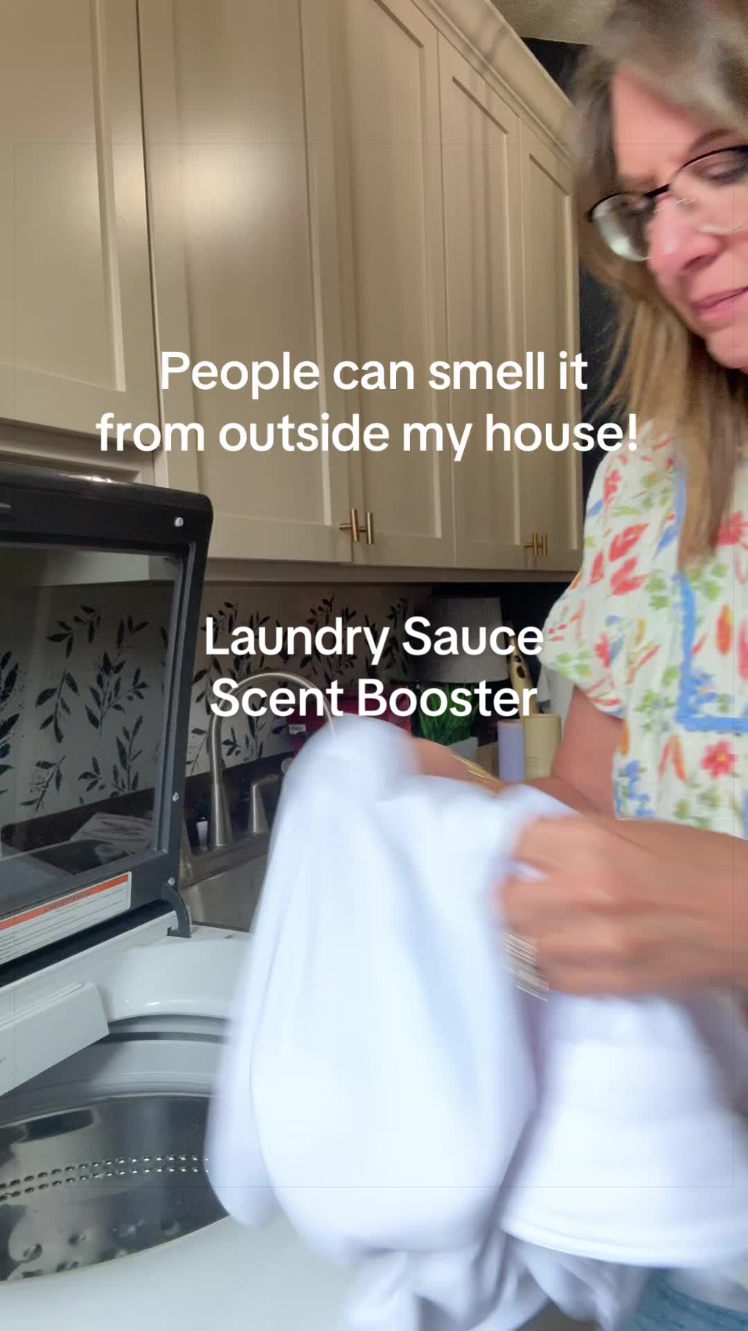 TikTok post by @yayafry for Laundry Sauce. Caption reads: [...] boosters are the icing on the cake! @Laundry....