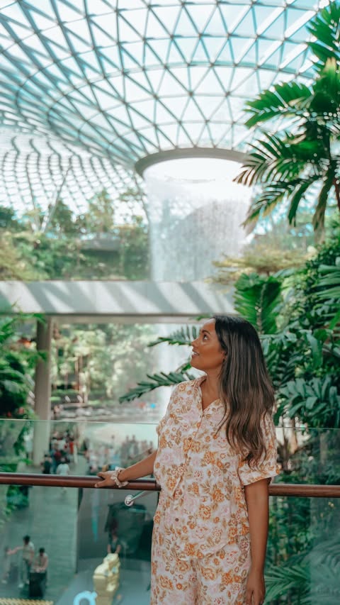 Instagram post by @ambasmiles for Visit Singapore. Caption reads: [...] in Singapore? 🌳 @visit_singapore....