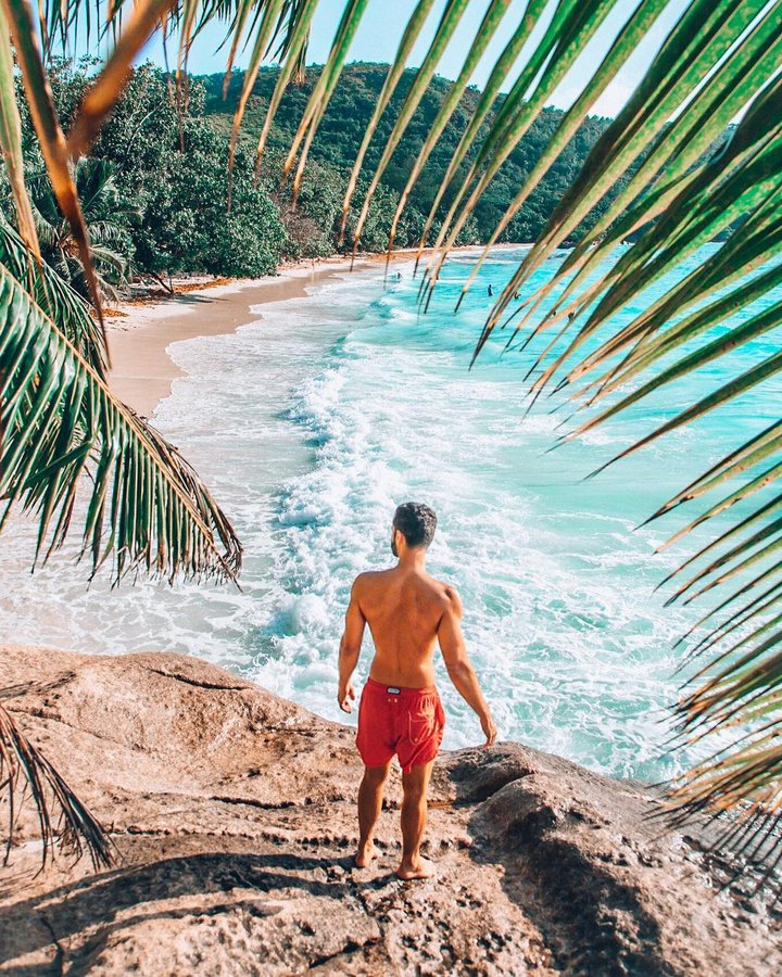 Instagram post by @andredemello for Condé Nast Traveller. Caption reads: ✨Hey guys! I know you love to travel as much as I....