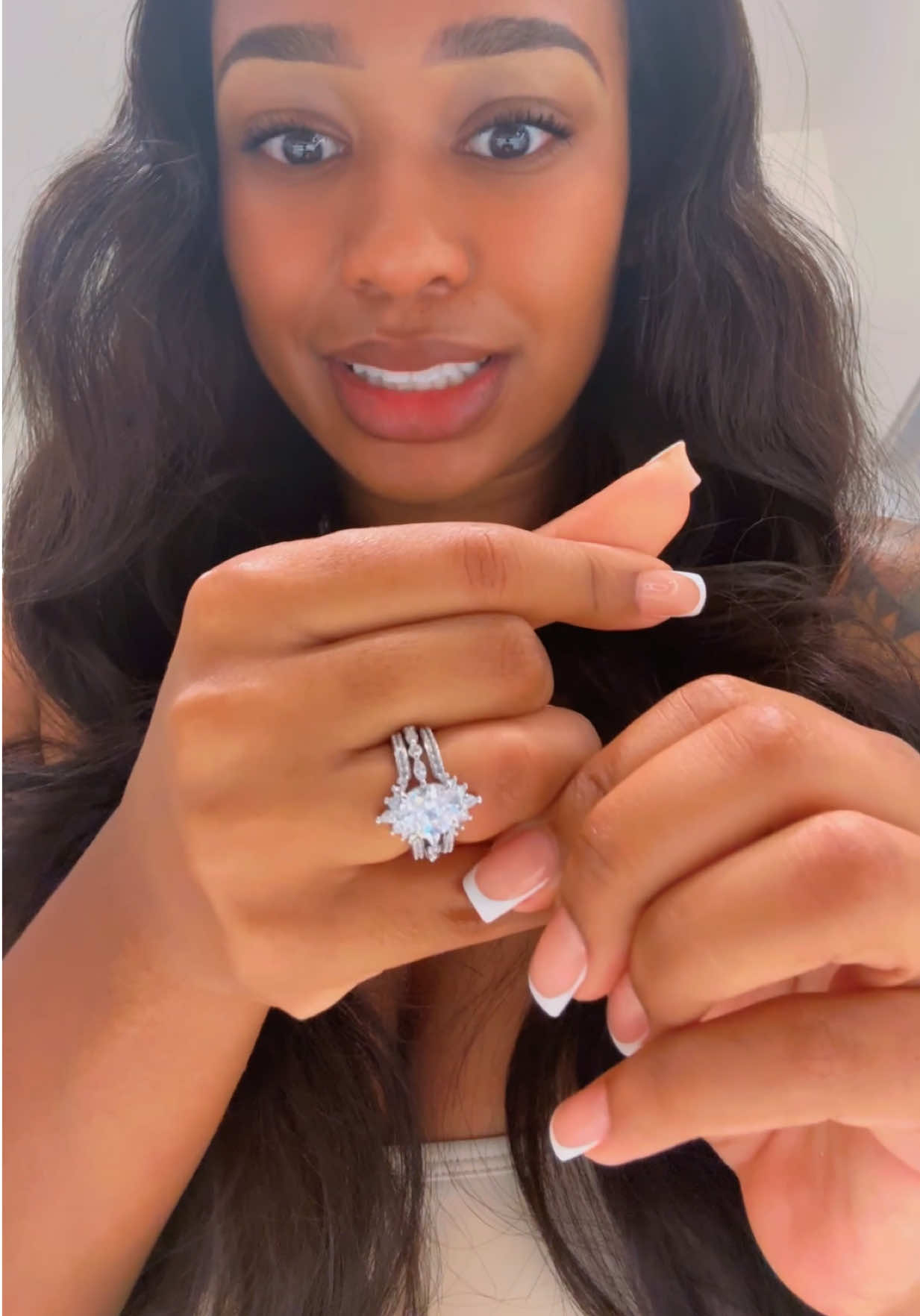 TikTok post by @realdealjwill for EAMTI Jewelry. Caption reads: [...] you ask, YES ITS STILL STUCK 😭😭😭 @@EAMTI....