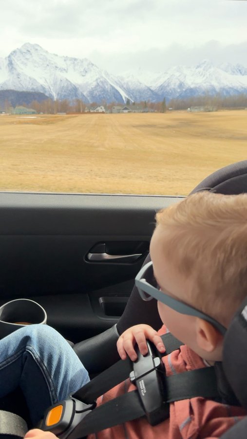 Instagram post by @two.and.twins.ak for Tiny Traveler. Caption reads: [...] and mountain views 😍

ad| The....