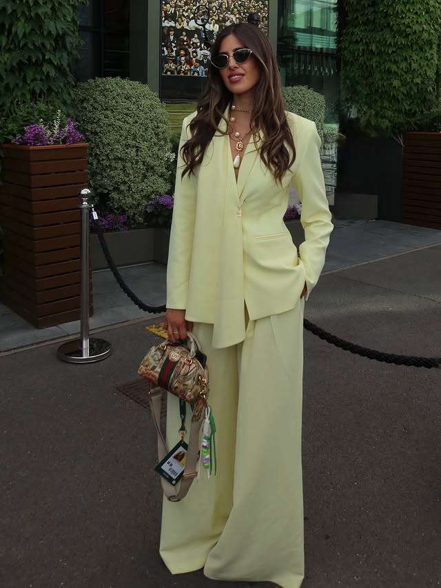 Instagram post by @yasmine_myz for Karen Millen. Caption reads: Wimbledon has officially started 💛 🎾 Day 1 look....