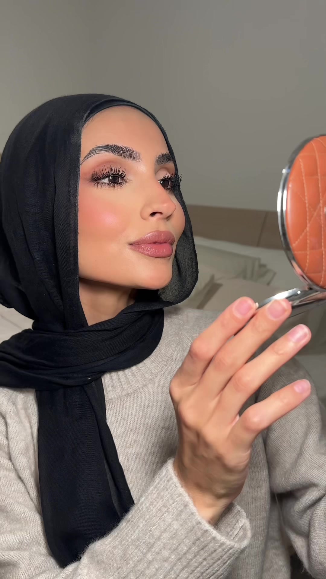 TikTok post by @razanxmualla for Hourglass Cosmetics. Caption reads: [...] back 🙂‍↕️🤍🤍 @e.l.f. Cosmetics  @REFY ....