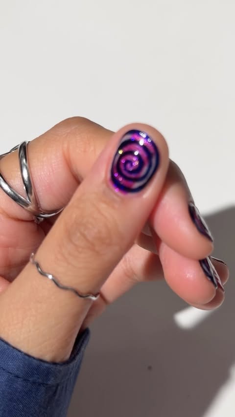 Instagram post by @nonnailartist for L.A. Girl Cosmetics. Caption reads: [...] sparkly spirals so much 🫟 Using....