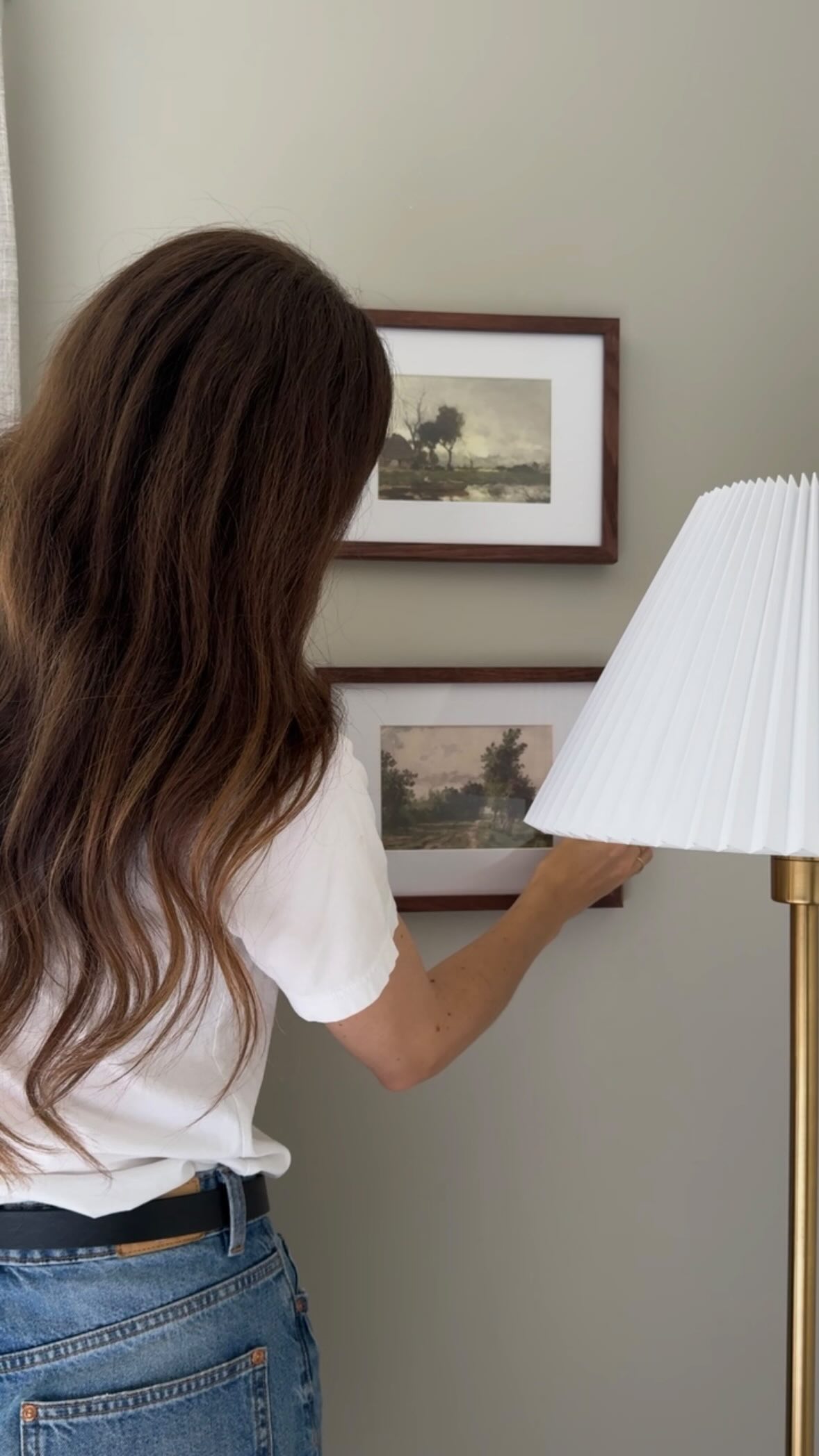 Instagram post by @itsmelissabailey for Opposite Wall. Caption reads: It’s amazing how the right wall art can completely....