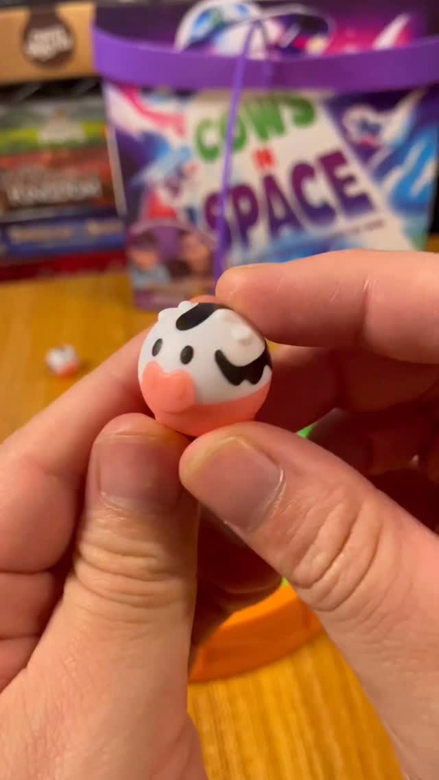 Instagram post by @tiktokboardgames for What Do You Meme. Caption reads: We come in peace 👽🛸 Cows in space is an awesome....