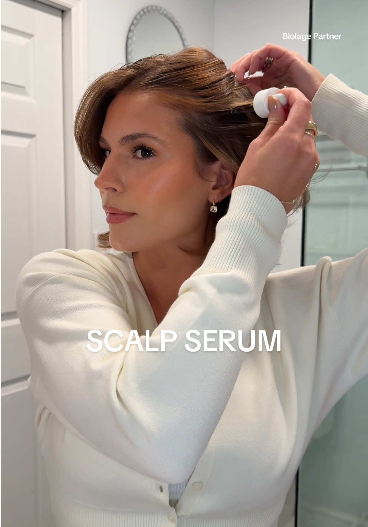 TikTok post by @kylaleelee for Biolage. Caption reads: How to apply the @BIOLAGE full rescue scalp serum....