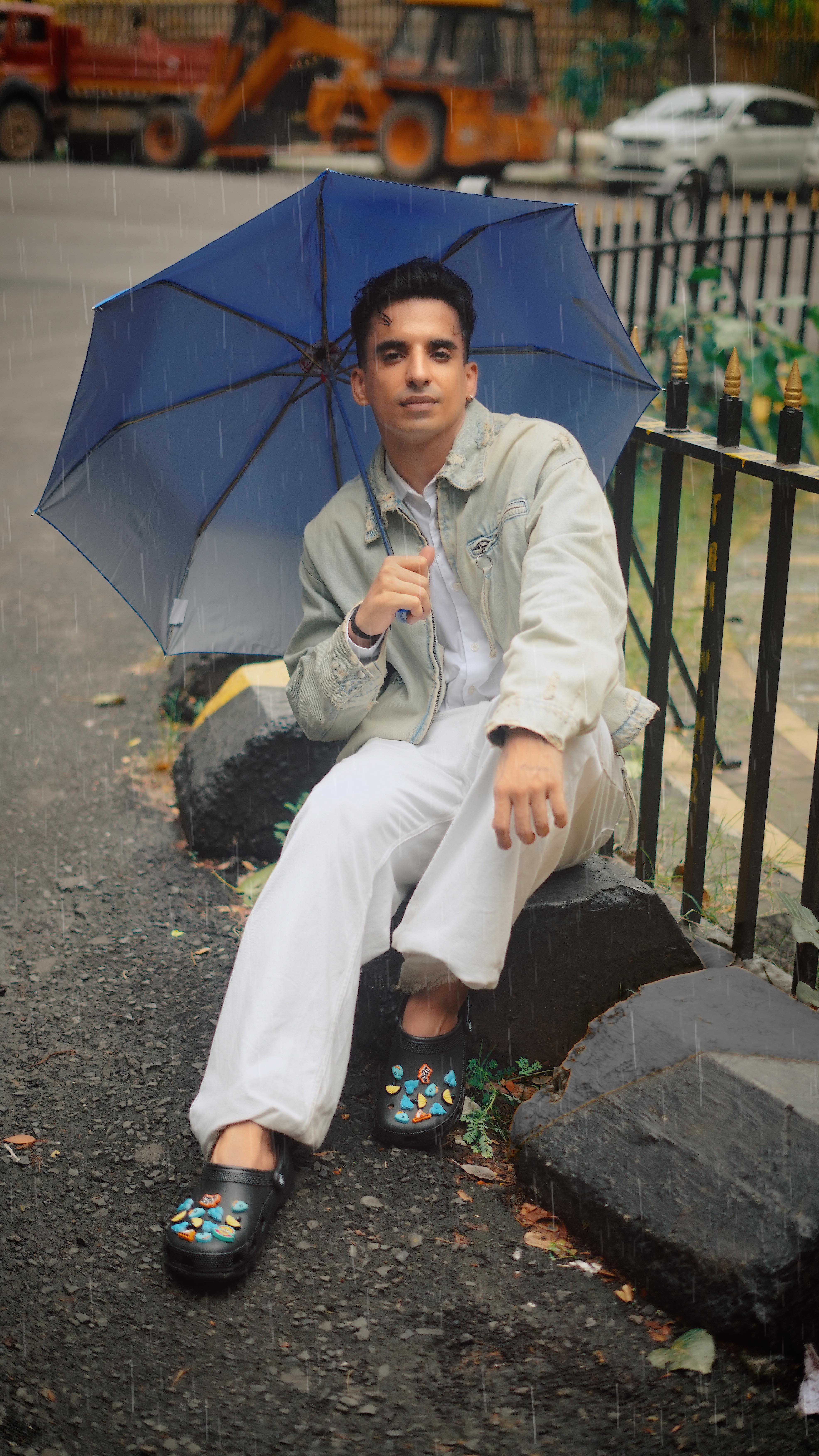 Instagram post by @himanshu_dulani for Crocs. Caption reads: This rain has K-drama written all over it 🤭☔️....