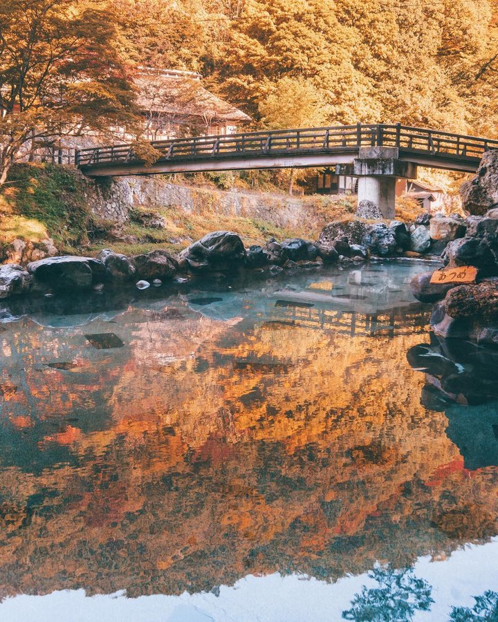 Instagram post by @travelalut for Discover Earth. Caption reads: AUTUMN! 🍁 The Tohoku region in the very north of....