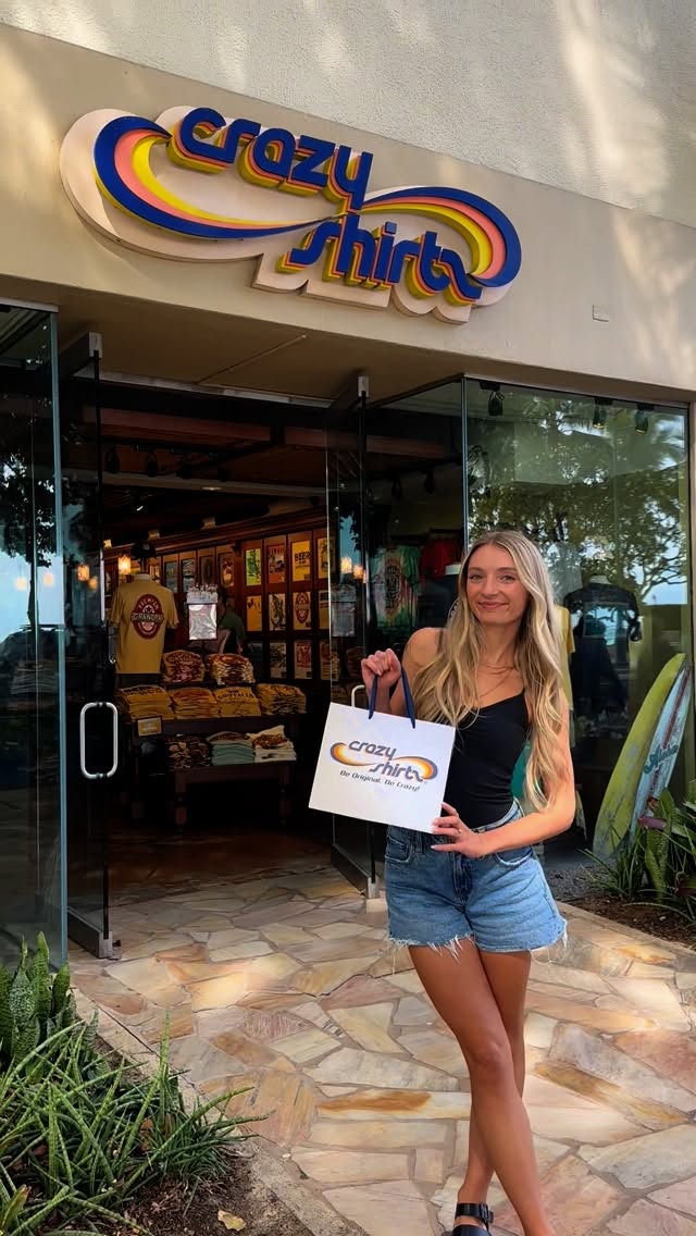 Instagram post by @makenna.beckman for Crazy Shirts. Caption reads: [...] 👀🔥 While in Waikiki, we found @crazyshirts....