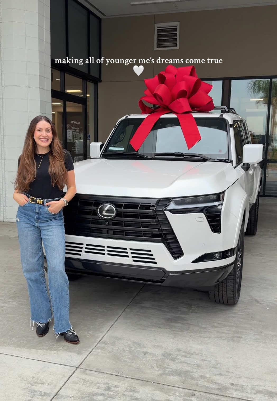 TikTok post by @kendall.ferrari for Lexus. Caption reads: Still can’t believe I got to pick up my dream car....