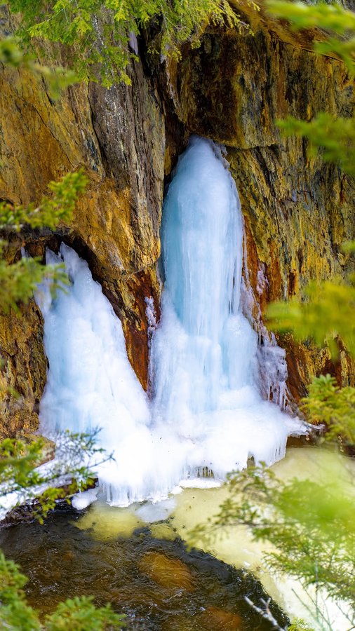 Instagram post by @camtravelz for Visit Maine. Caption reads: Rangeley’s Smalls Falls Waterfall Hike 💧

If you....