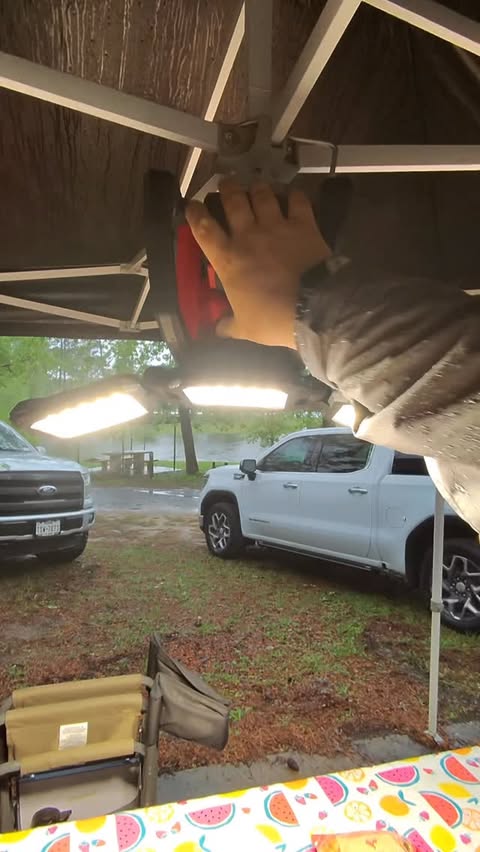 Instagram post by @someguywithtools for Milwaukee Tool. Caption reads: Rainy nights camping are perfect uses for....