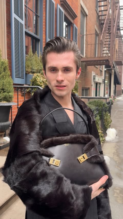 Instagram post by @dylkelly for FERRAGAMO. Caption reads: Be mine @ferragamo #FerragamoHugBag #ad.