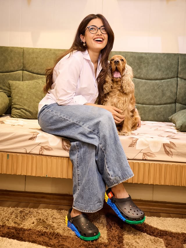 Instagram post by @rashmika_mandanna for Crocs. Caption reads: She’s my LEGO clog!❤️ #Partnership.