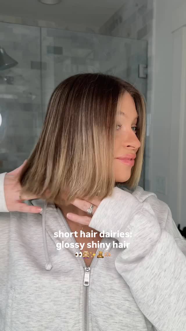 Instagram post by @_withsarah for Kristin Ess Hair. Caption reads: [...] weapon to my glossiest hair yet…....