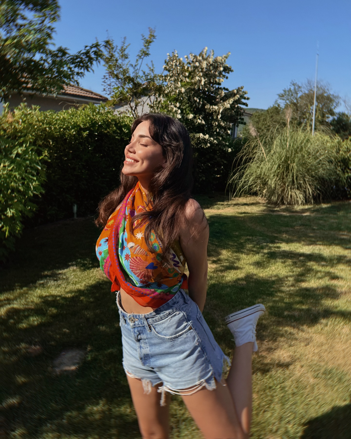 Instagram post by @merveozcan for Twist. Caption reads: golden days and carefree ways🌞✨🌈🍉 @twistturkiye....