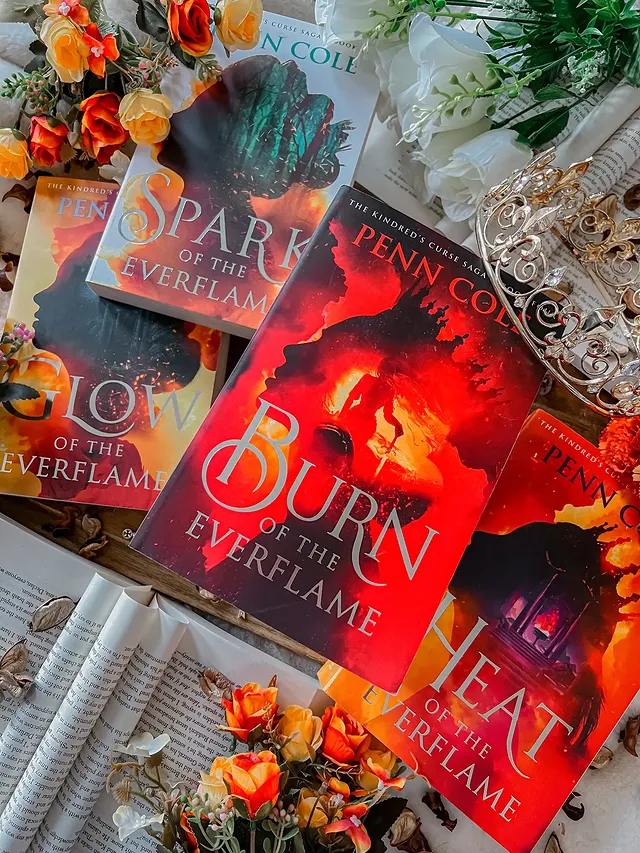 Instagram post by @catsandpaperbacks for Simon & Schuster. Caption reads: 🔥 Burn of the Everflame 🔥 The month and year is....