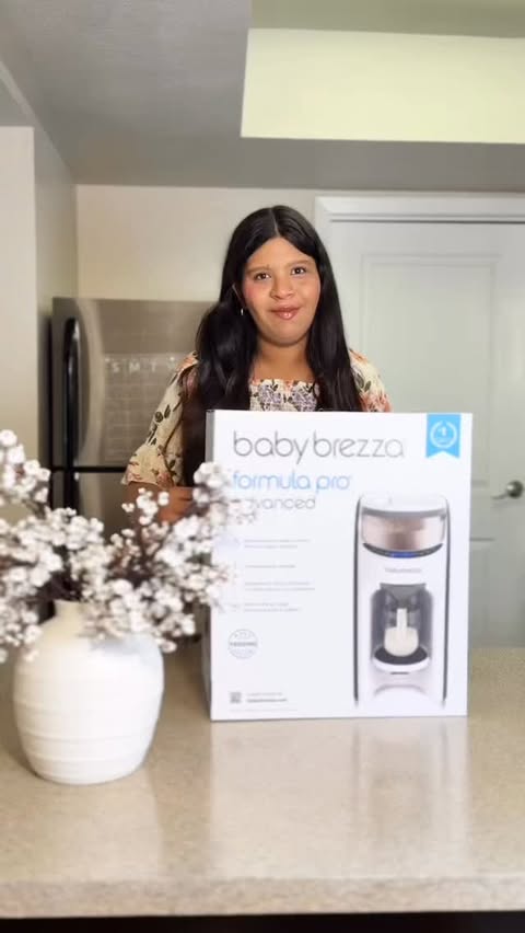 Instagram post by @claudy.anderson for Baby Brezza. Caption reads: [...] you don’t realize you need, but the Baby....