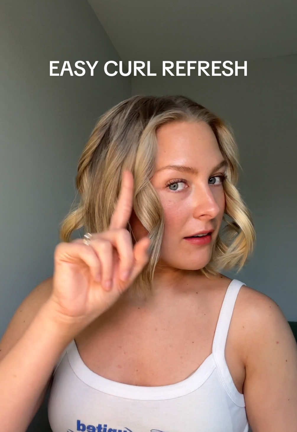 TikTok post by @merequan for L'ange Hair. Caption reads: some might say short hair is actually lower....