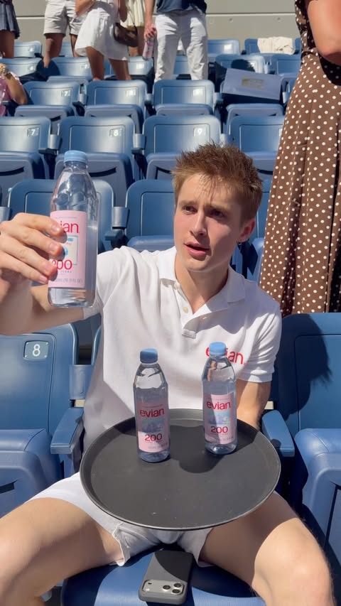 Instagram post by @olliemuhl for evian. Caption reads: Water boy era @evianwater #evianpartner.