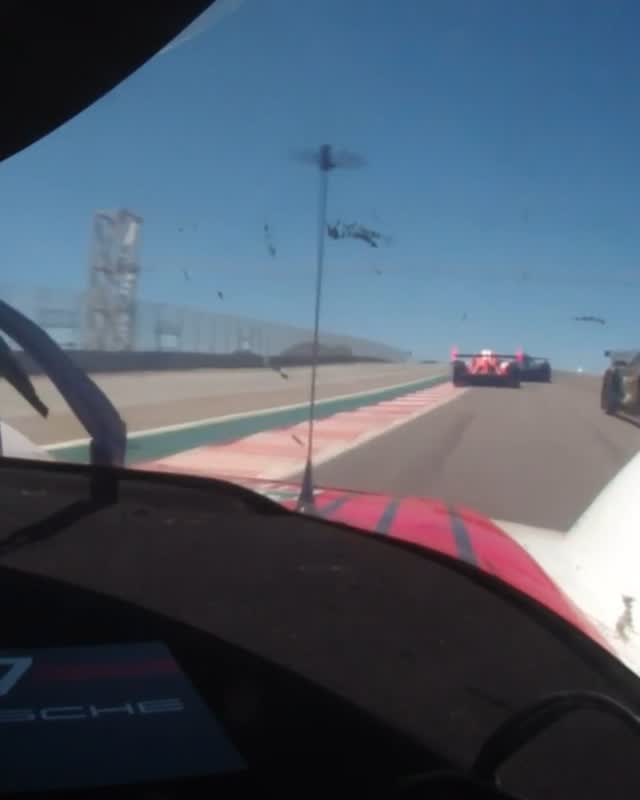 Instagram post by @porschemotorsportnorthamerica for TAG Heuer. Caption reads: The Corkscrew. Where gravity meets....