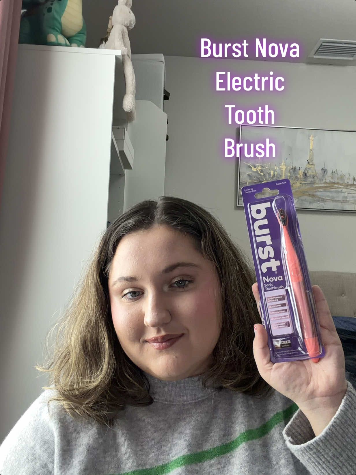 TikTok post by @elizabethdimitrova5 for Burst Oral Care. Caption reads: @BURST Oral Care #electricttoothbrush #paid.