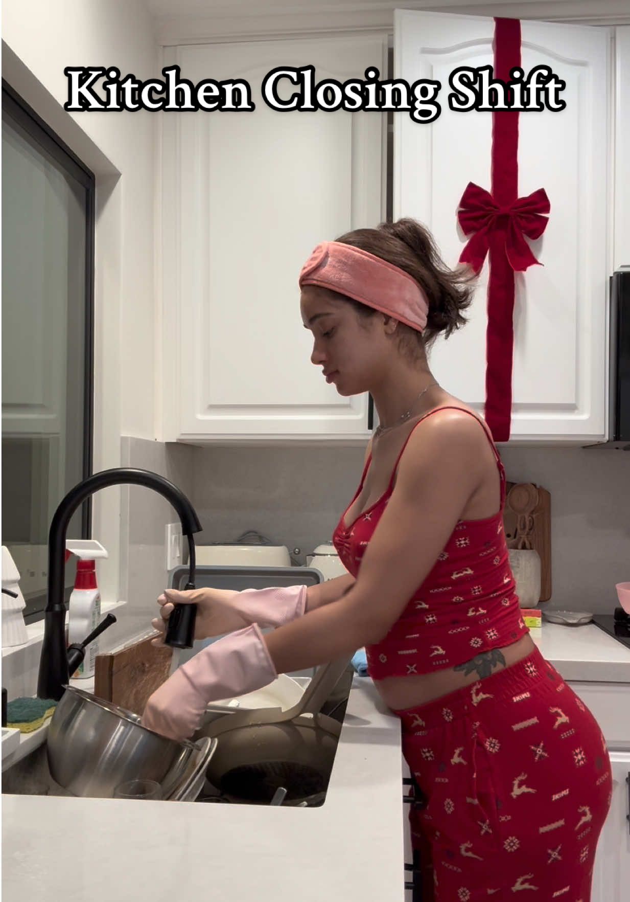 TikTok post by @lalatheislandgal for Poppi. Caption reads: A bare minimum kitchen clean before bed 🧼🫧🎀 I....