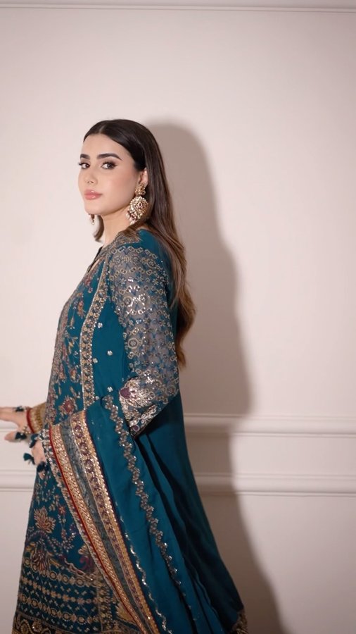 Instagram post by @rafyaminhas for Iznik Fashion. Caption reads: Festive season outfit inspo ft. @iznikfashion ✨🤍.