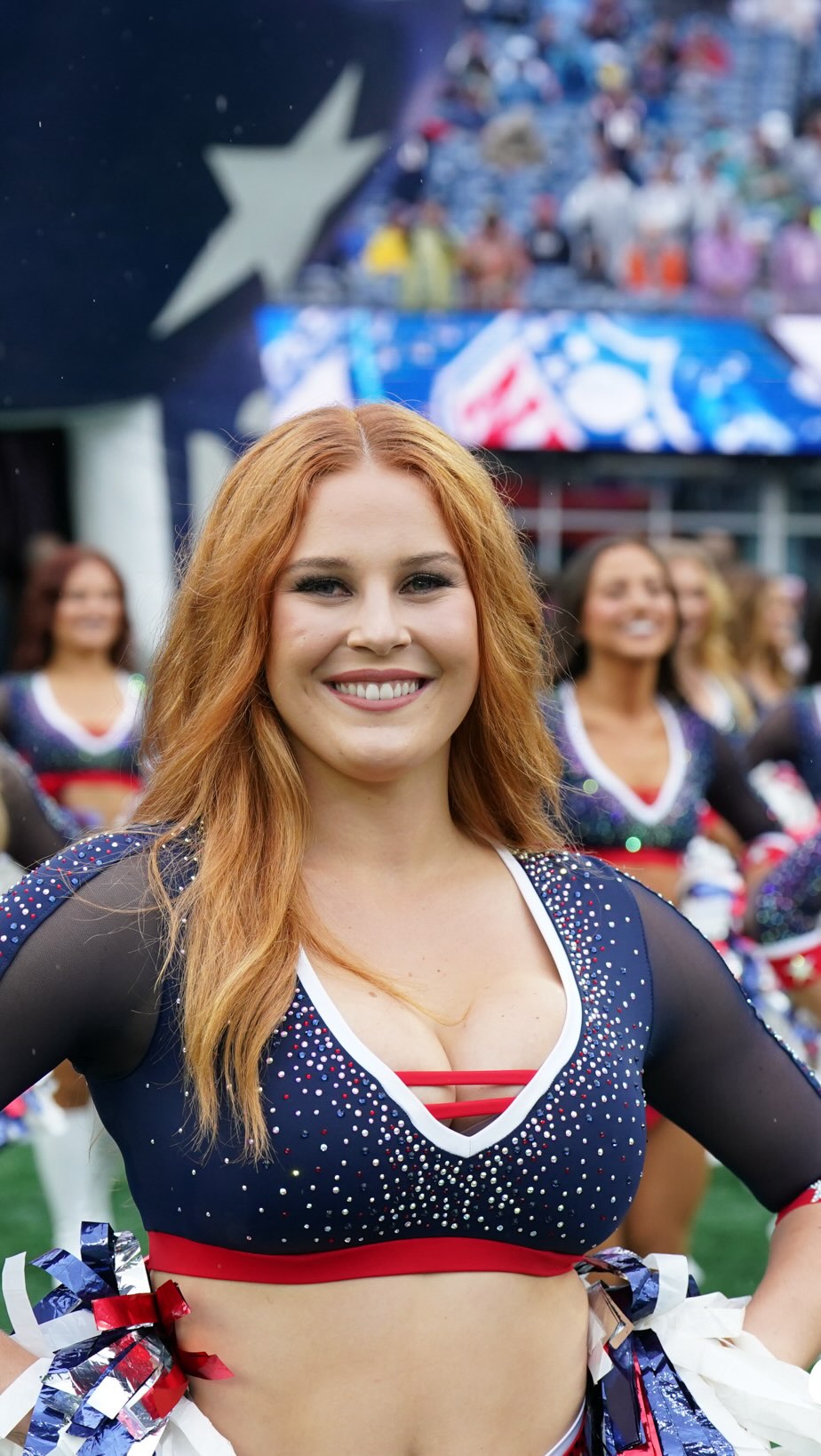 Instagram post by @patriotscheerleaders for impressbeauty. Caption reads: NEPC Lana + @kissnails = perfection! Come see KISS....