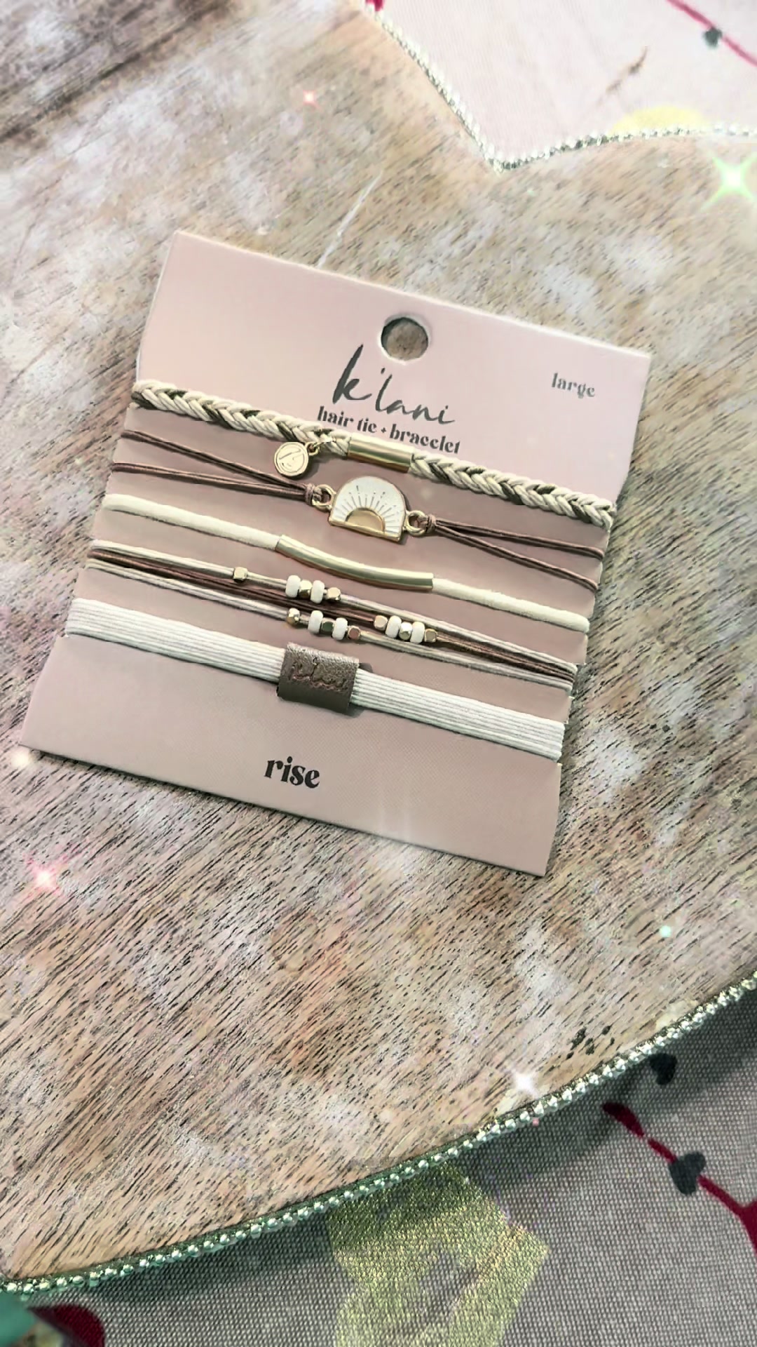 TikTok post by @rae_coyne for K’Lani. Caption reads: @K'lani #hair #hairtok #hairtie #hairties.