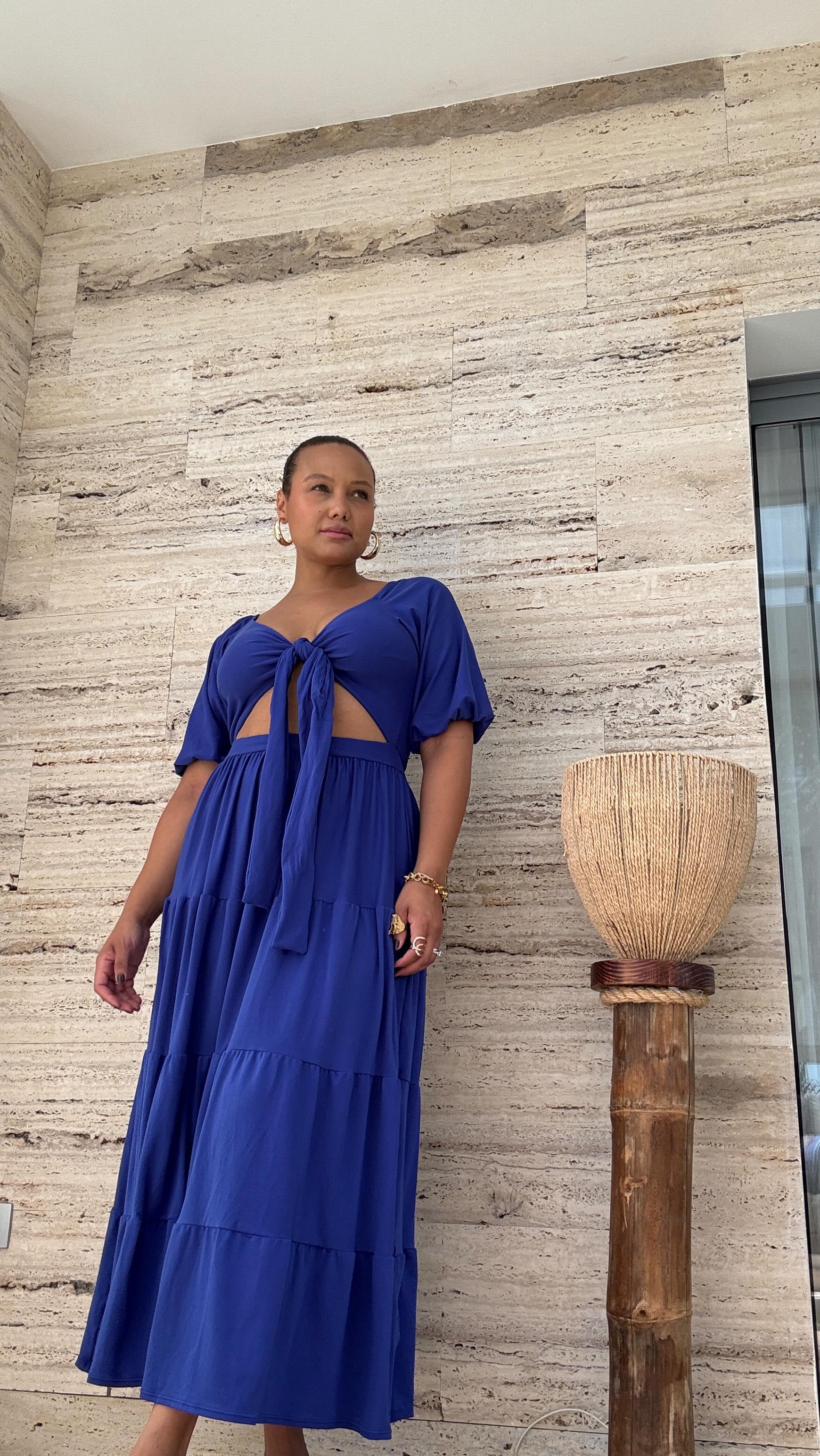 Instagram post by @griselangel for REBDOLLS. Caption reads: Trying on my favorite @rebdolls dresses for the....