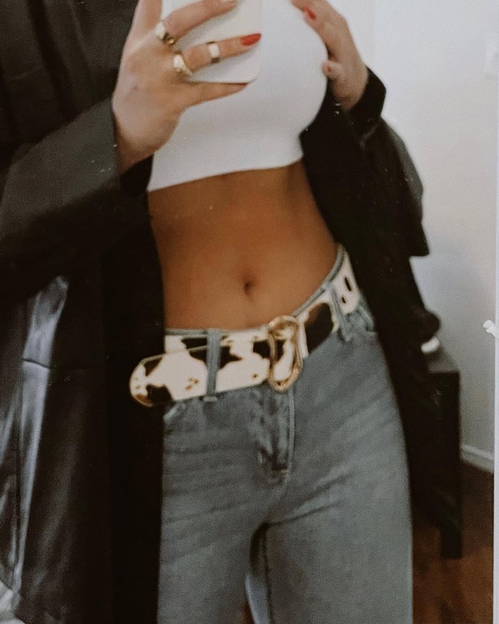 Instagram post by @urbanindie for Just Black Denim. Caption reads: is low rise back? 🐄 @justblackdenim discount code....