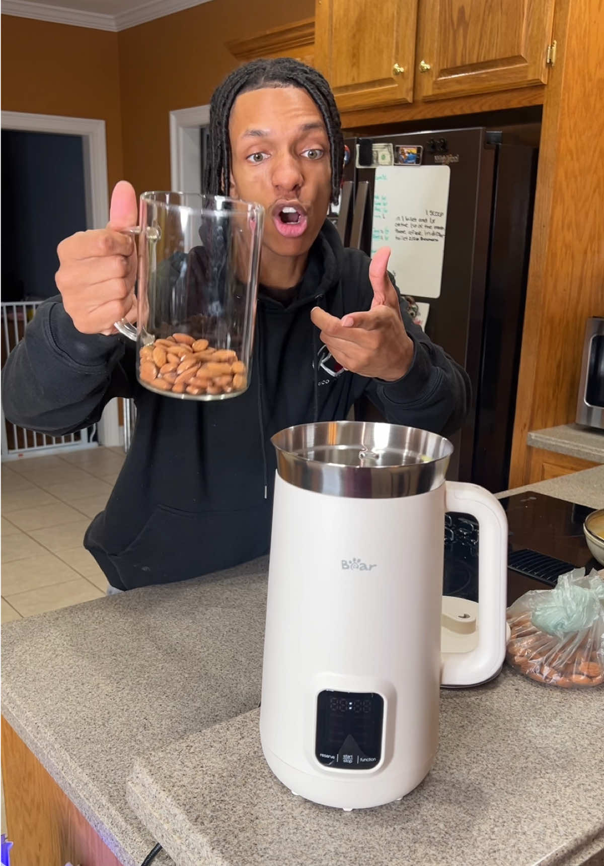 TikTok post by an influencer for Bear Electric Appliance - US. Caption reads: [...] believe me…😎🥛@Bear Electric Appliance - US....