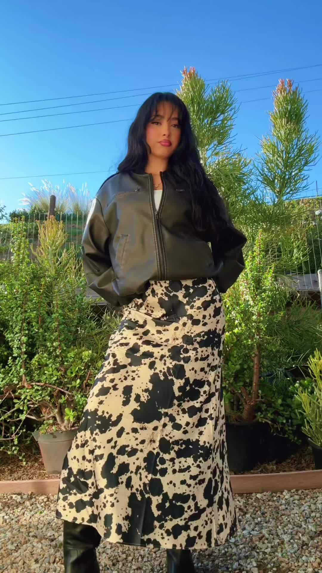 TikTok post by @tanyaa0444 for 12th Tribe. Caption reads: 🐄@12TH TRIBE #12thtribe #ootd #outfit .