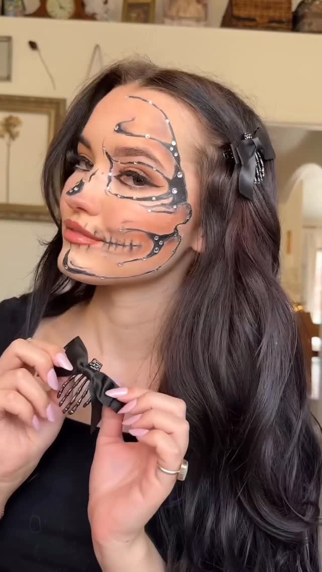 Instagram post by @meganreese__ for Kitsch. Caption reads: Skeleton Halloween Inspo 💀✨ Pair this hair and....