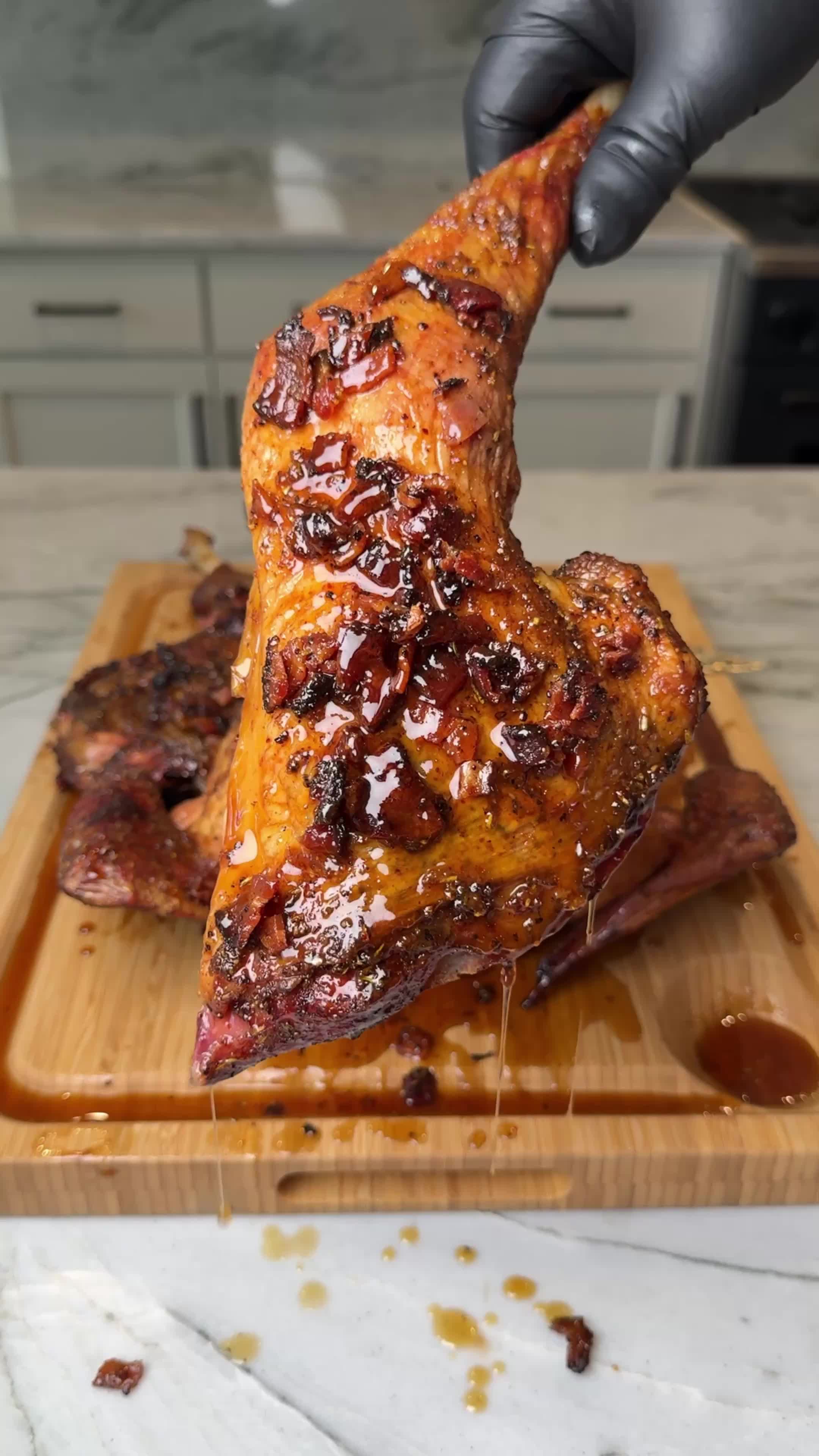 TikTok post by @burnt_pellet_bbq for Hy-Vee. Caption reads: Smoked Maple Bacon Turkey @Hy-Vee everything you....