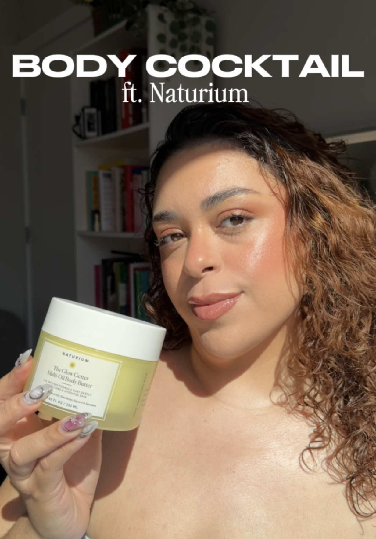 TikTok post by @cozywith.lili for Naturium. Caption reads: My version of a “body cocktail” using my Naturium....