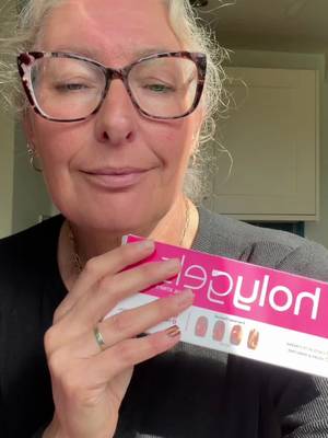 TikTok post by @mandapanda1531 for Holy Gels. Caption reads: New autumn nail wraps have launched @@Holy....