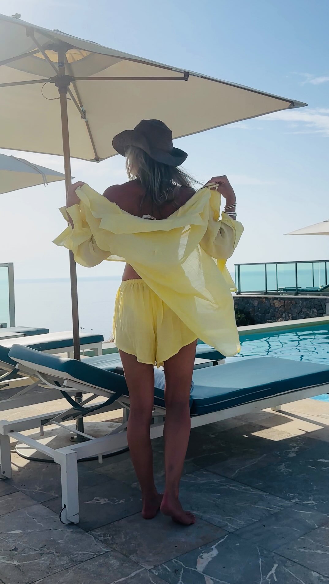 Instagram post by @abi.loves.style for OutDazl. Caption reads: [...] yellow sheer short & shirt set from @outdazl....