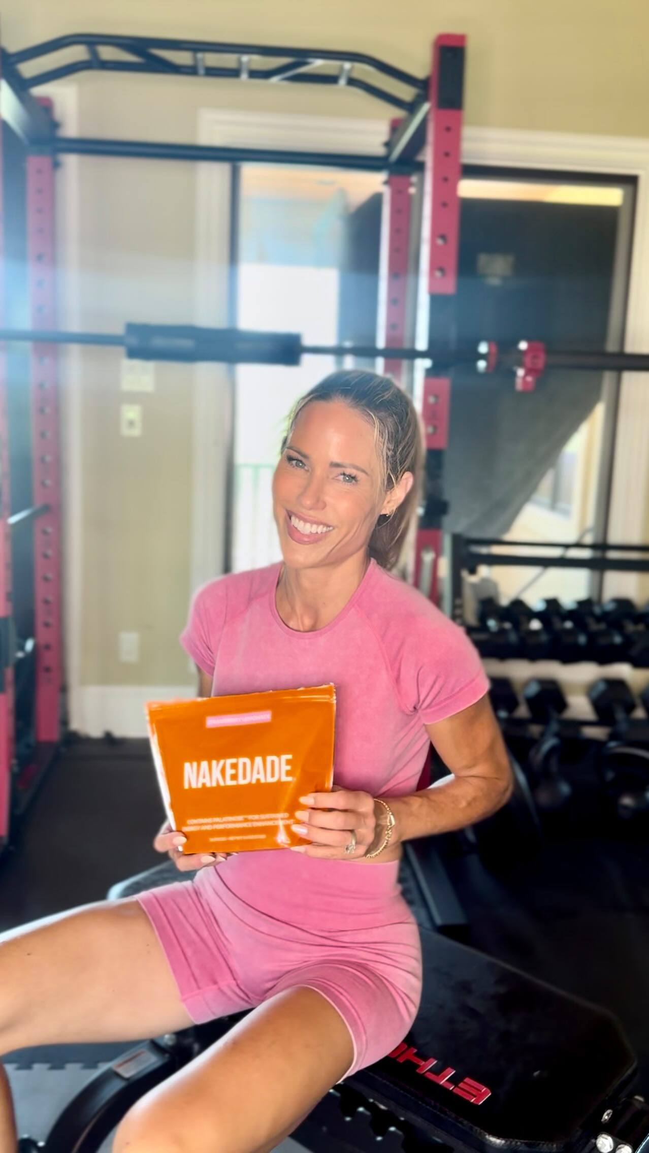 Instagram post by @hannahfit for NAKED nutrition. Caption reads: When I train hard I sweat A LOT!  When I sweat a....