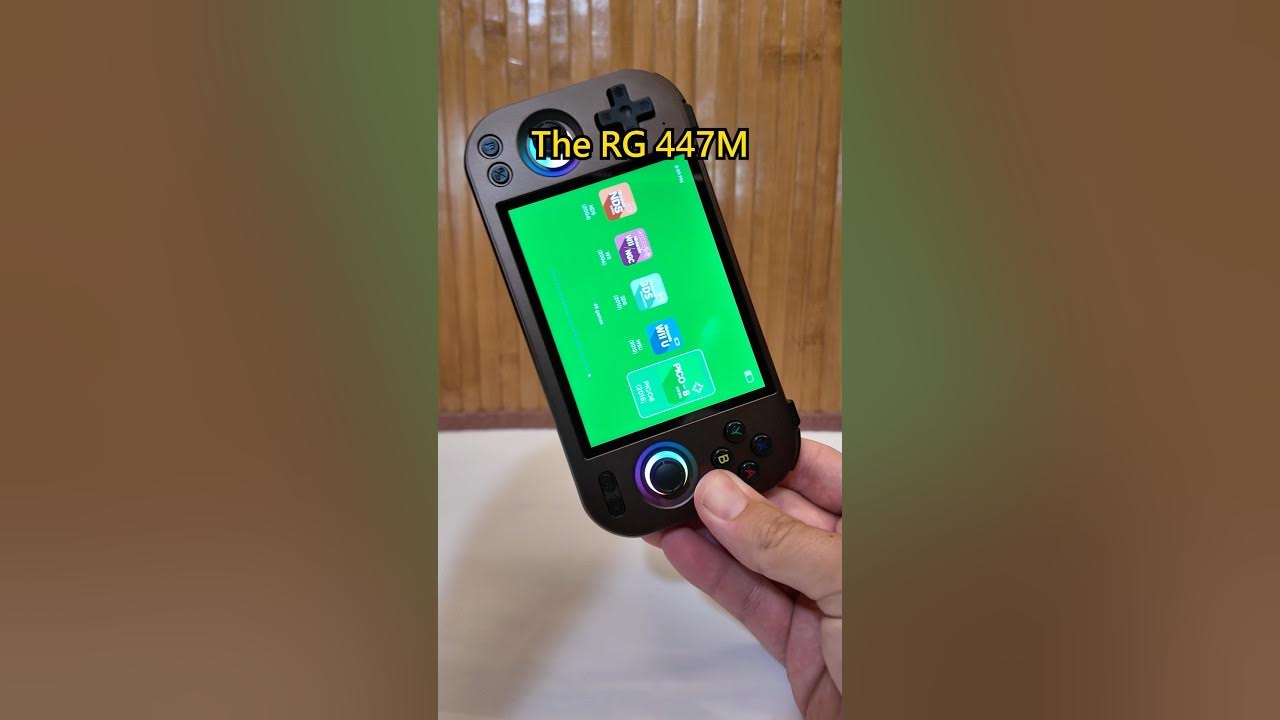 YouTube post by @DaveyG for LITNXT. Caption reads: Anbernic RG477M | The Most Metal Handheld of 2025?.